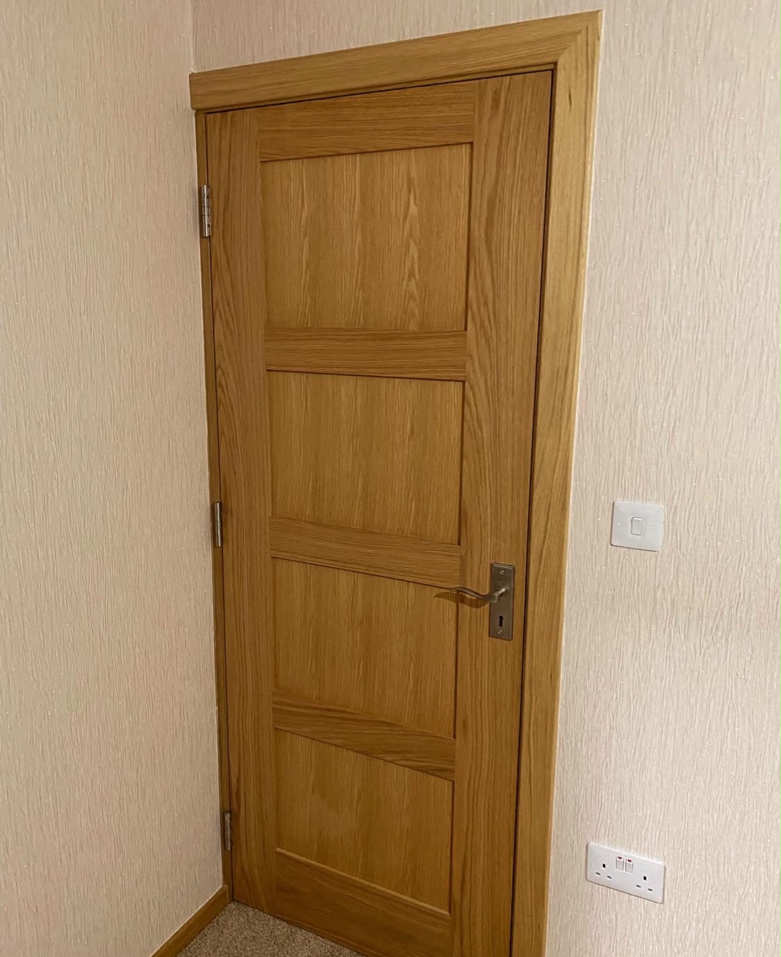 Four-panel oak internal door, finished and fitted