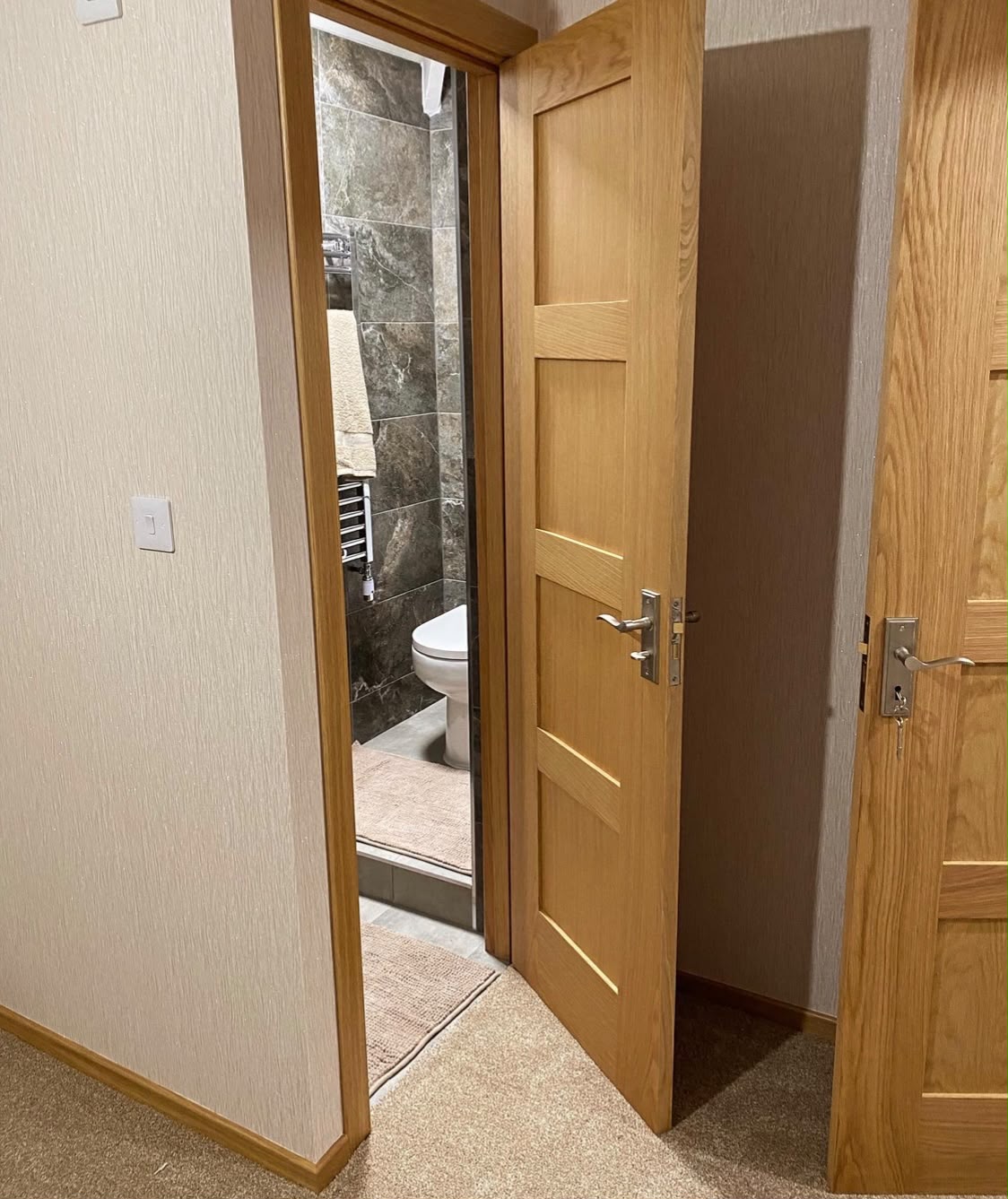 Pair of oak doors fitted on a landing, new frames and architrave